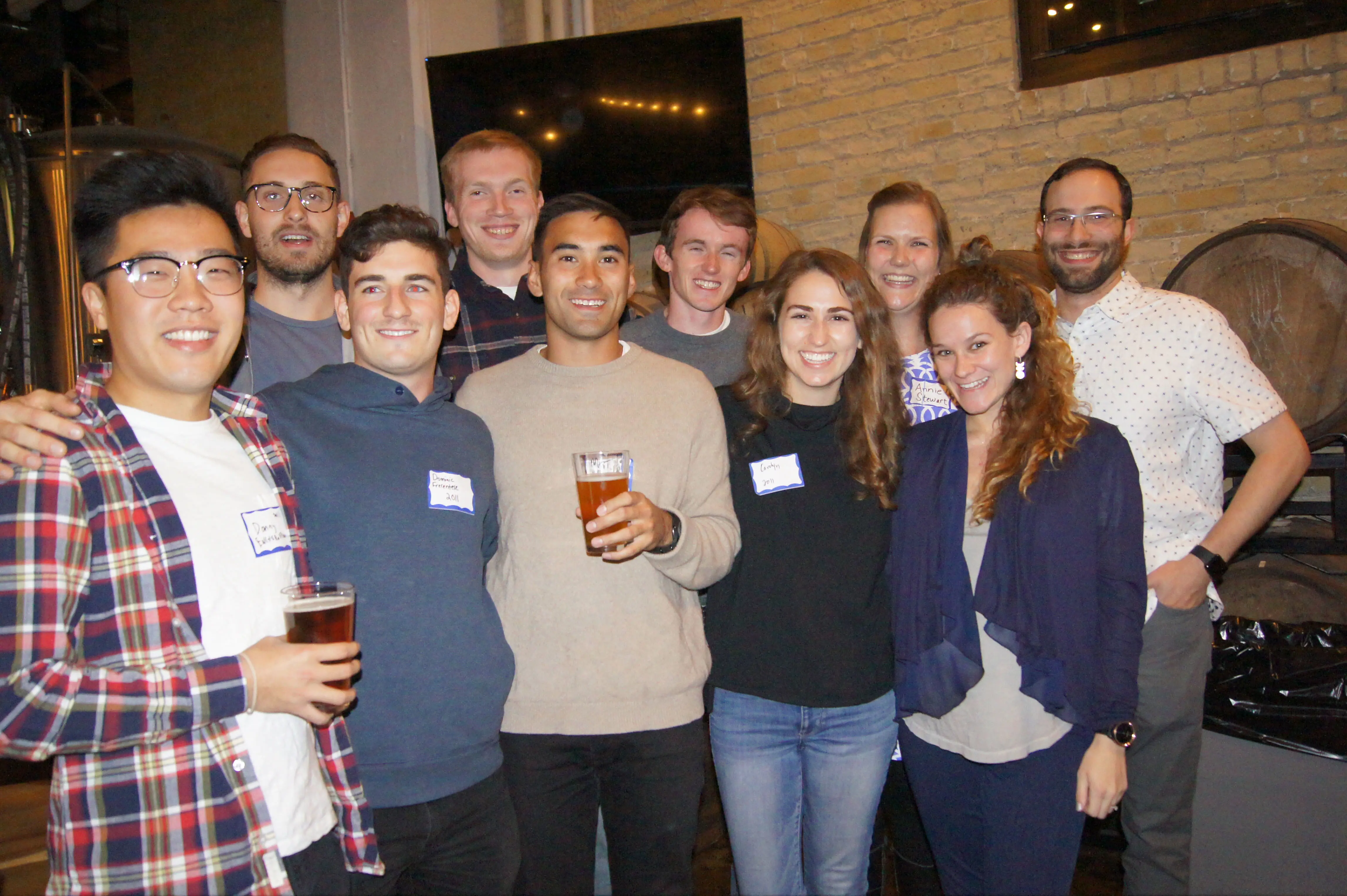 Alumni gathering at a school networking event.