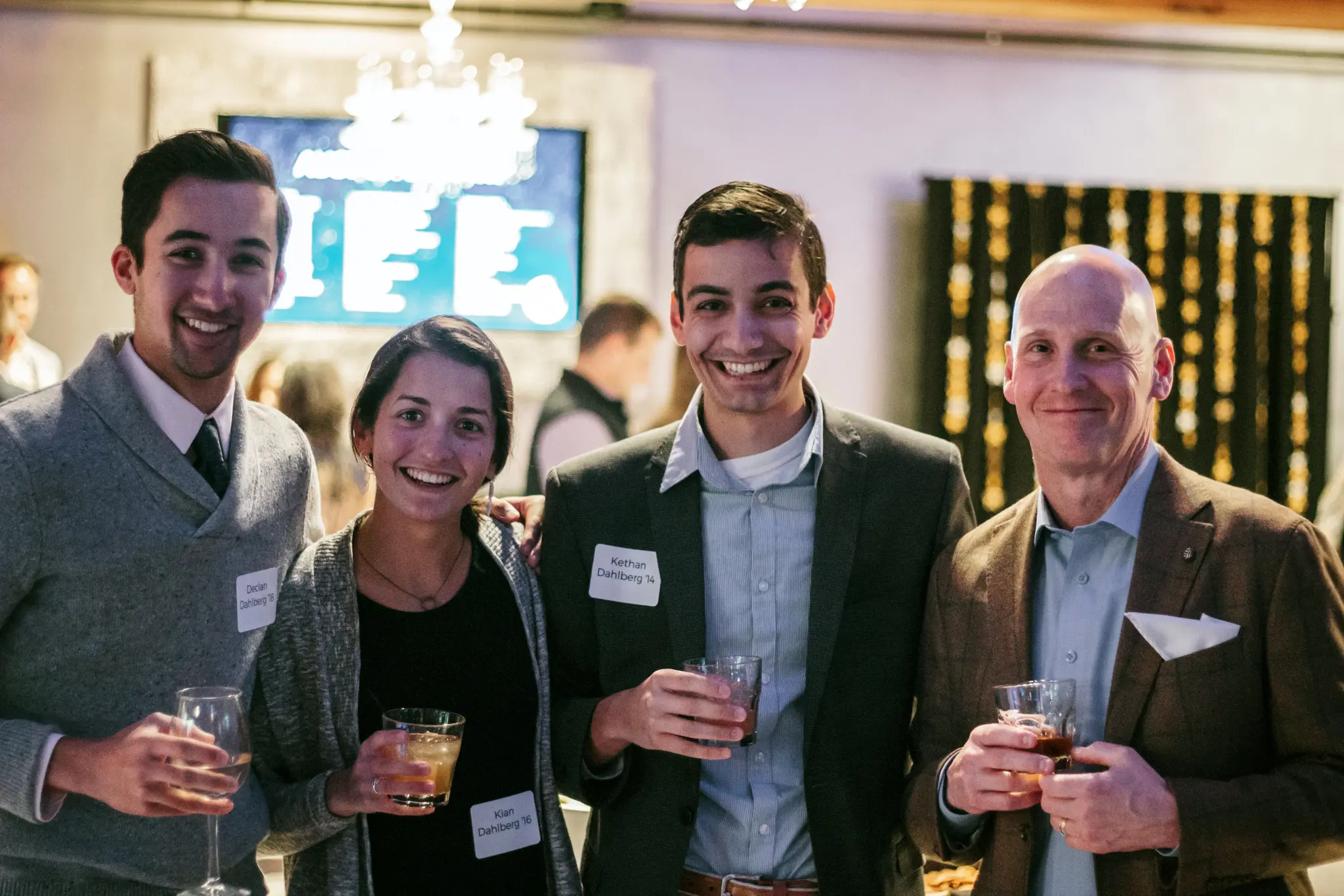 Alumni gathering at a school networking event.