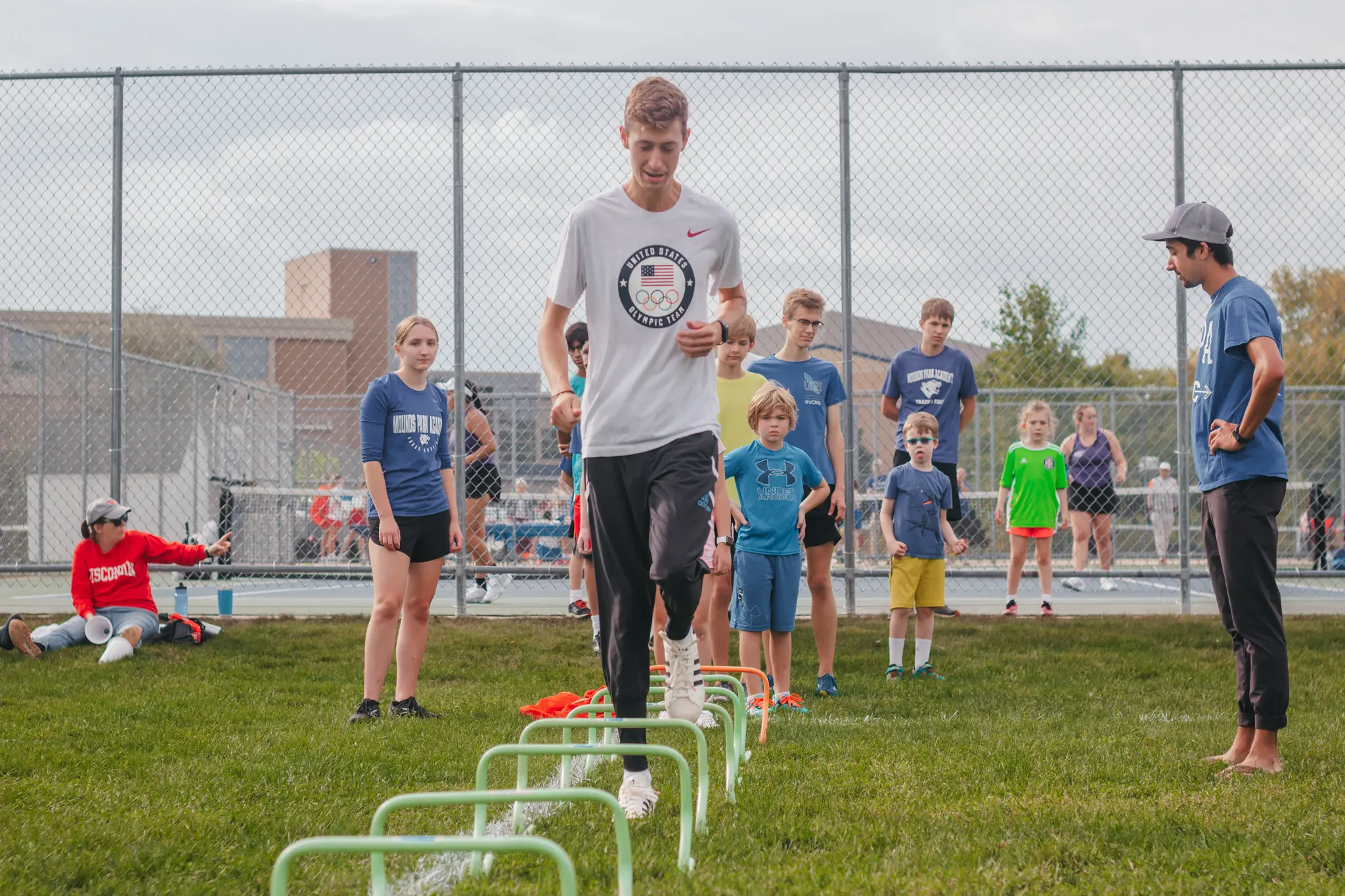 Student completing an agility drill during athletics training.