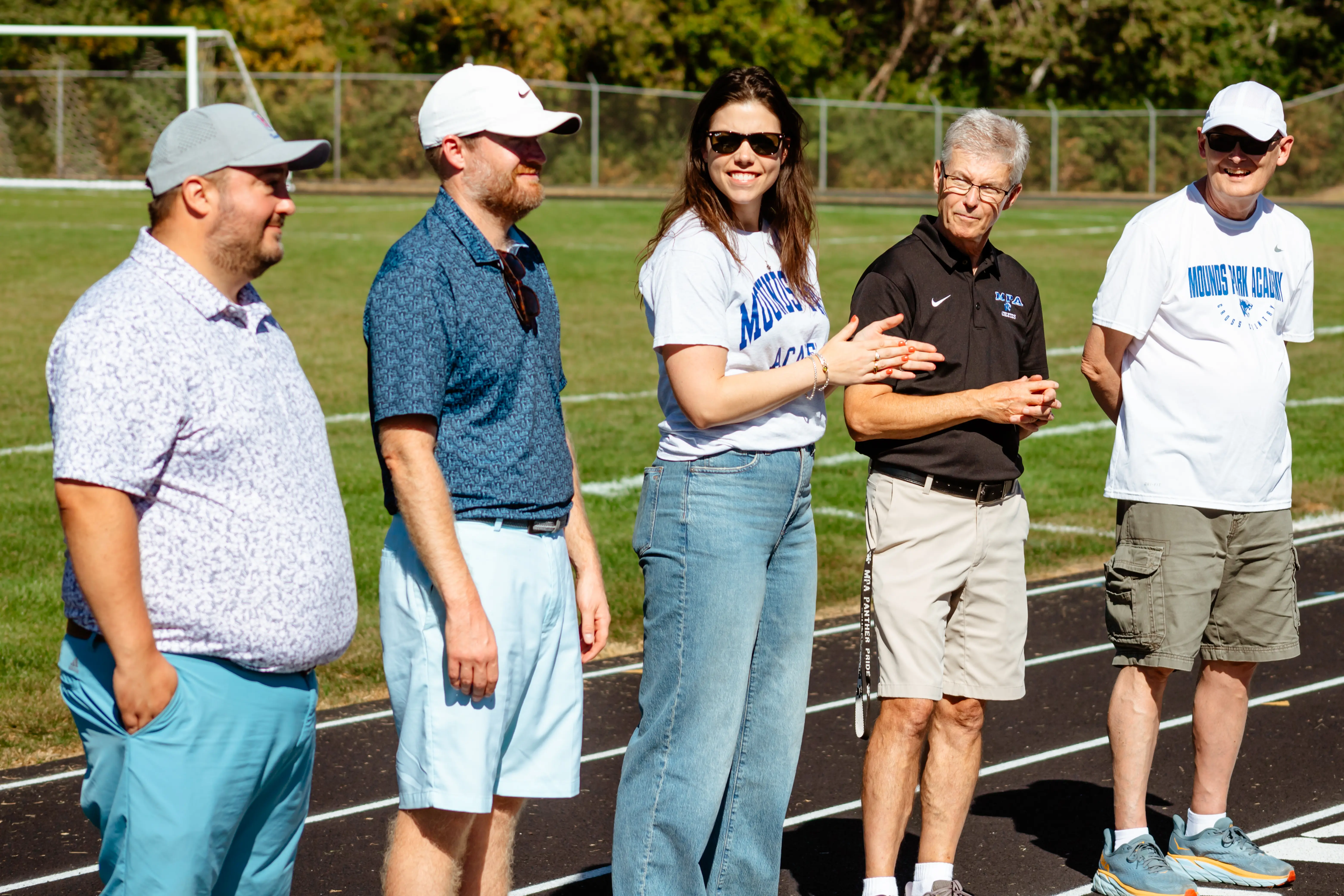 Alumni gathering at a school community event.
