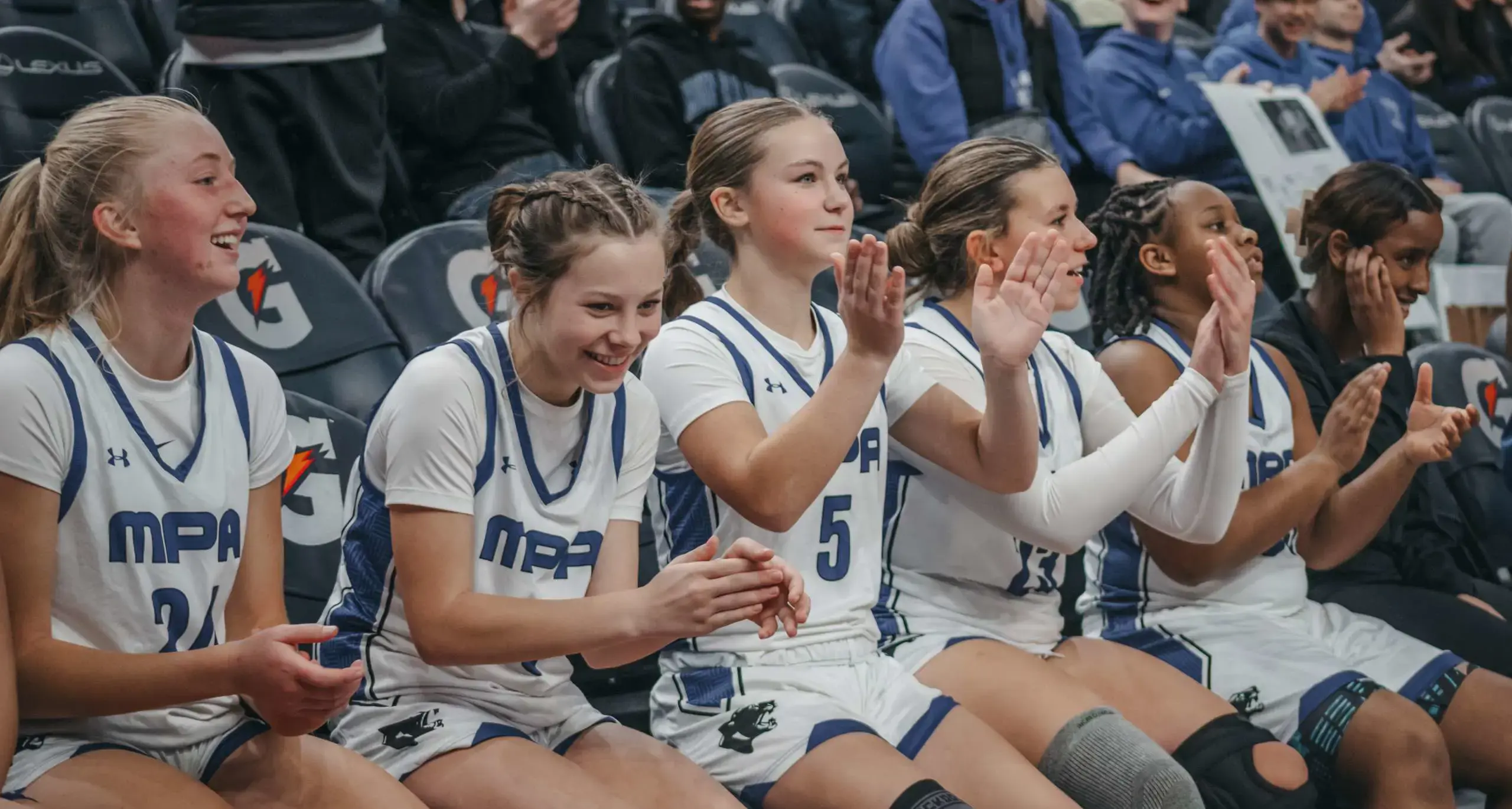Students cheering at a tournament