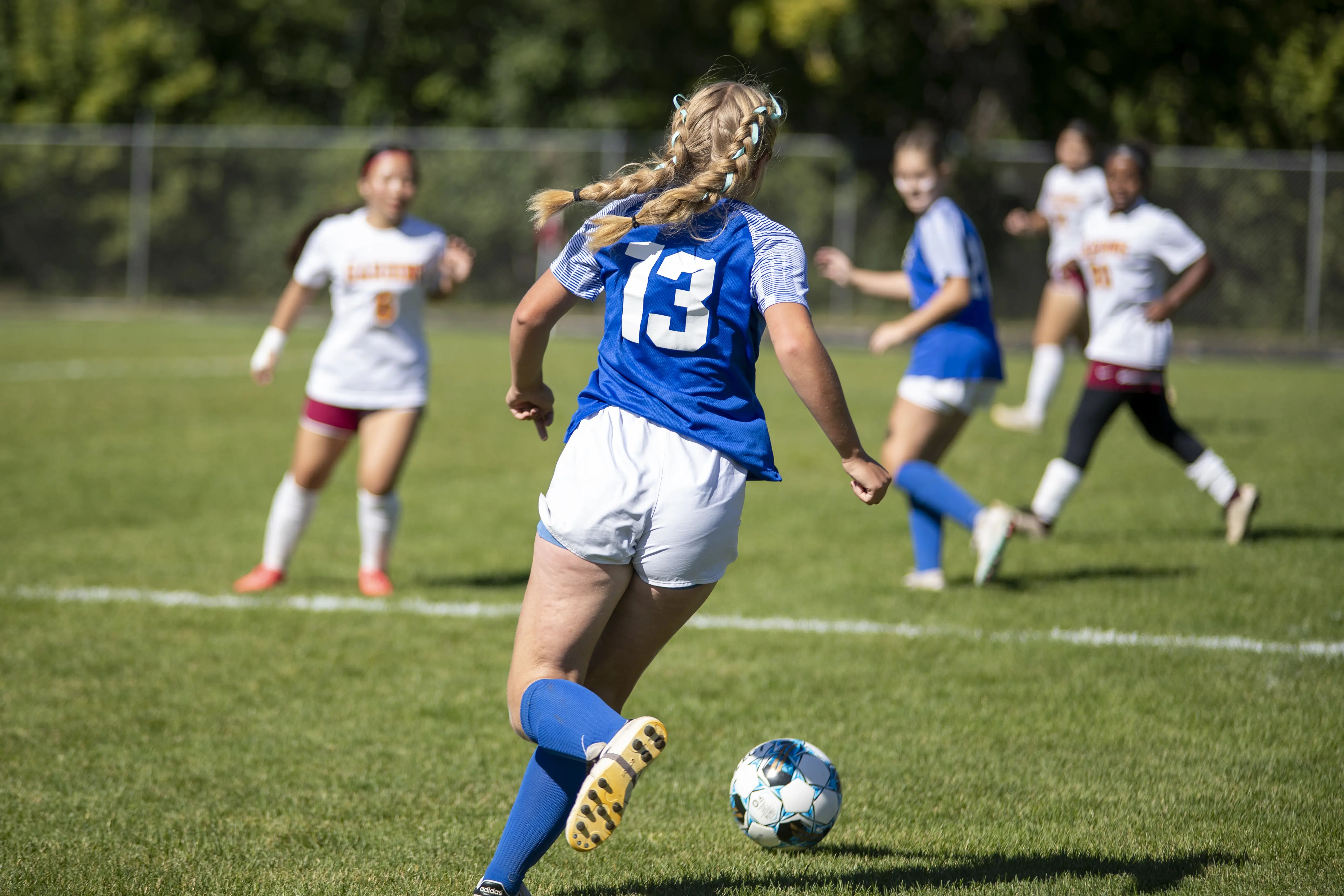Students playing in a soccer tournament