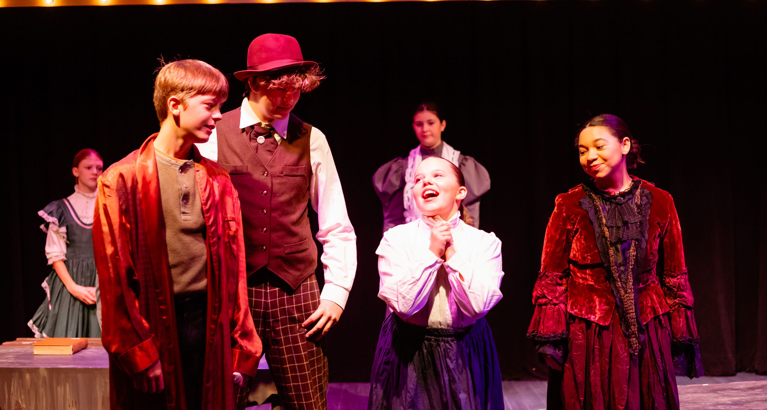 Students performing on stage