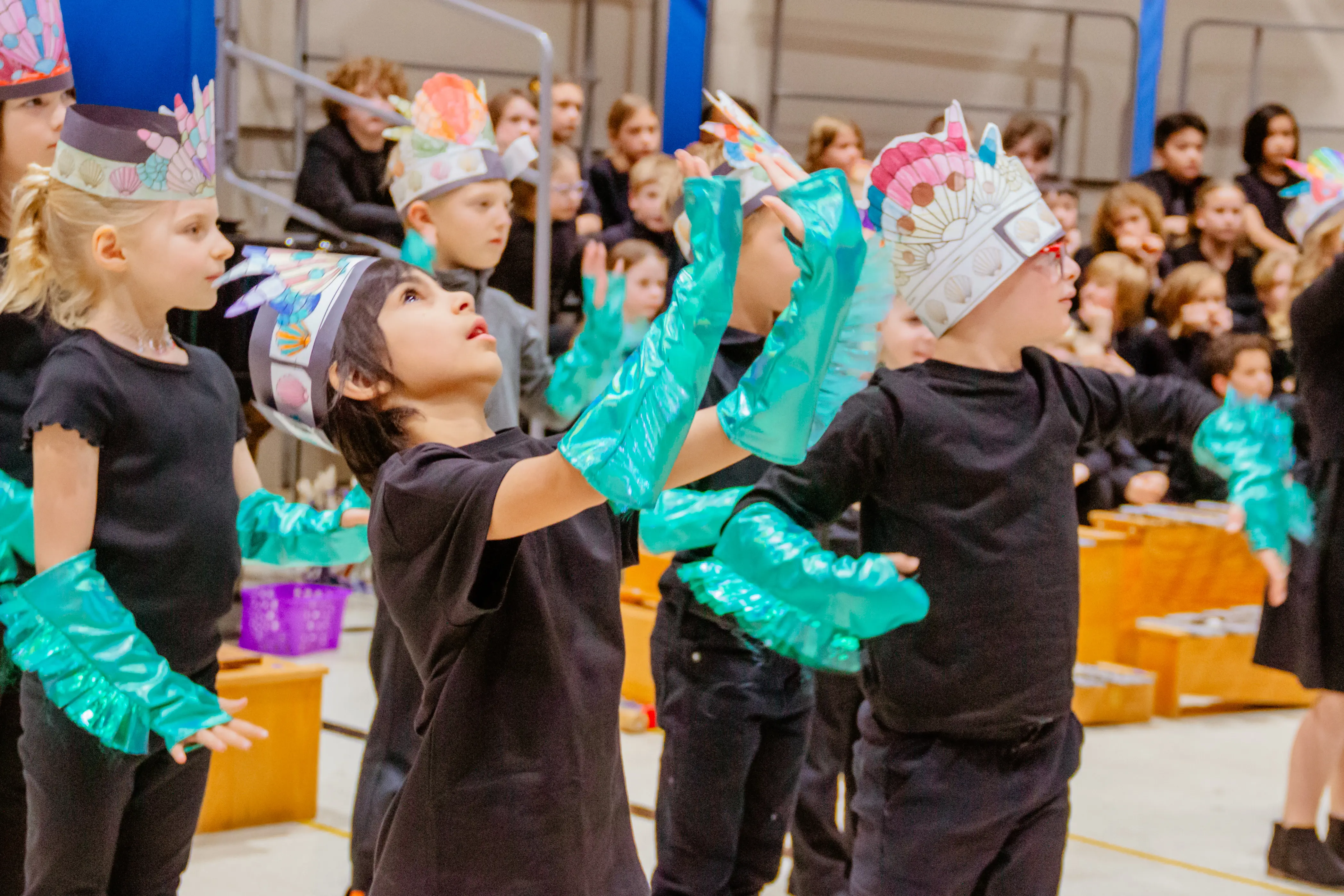 Lower school students performing in a school program