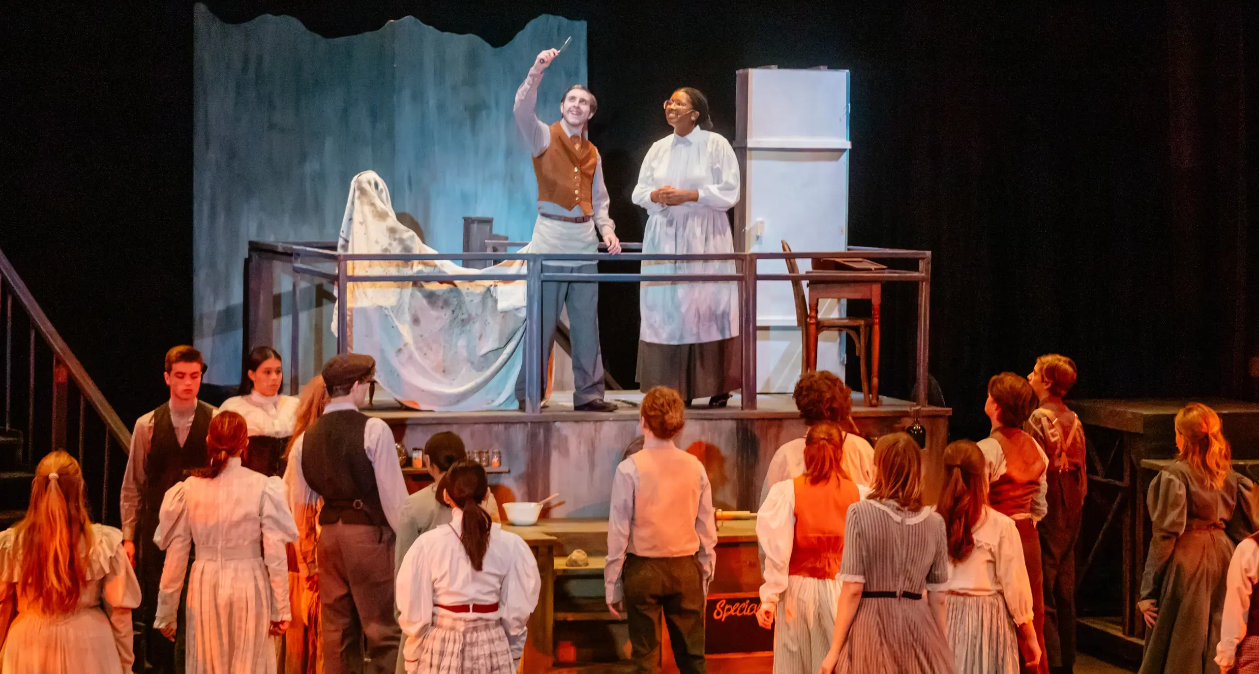 Students performing on stage