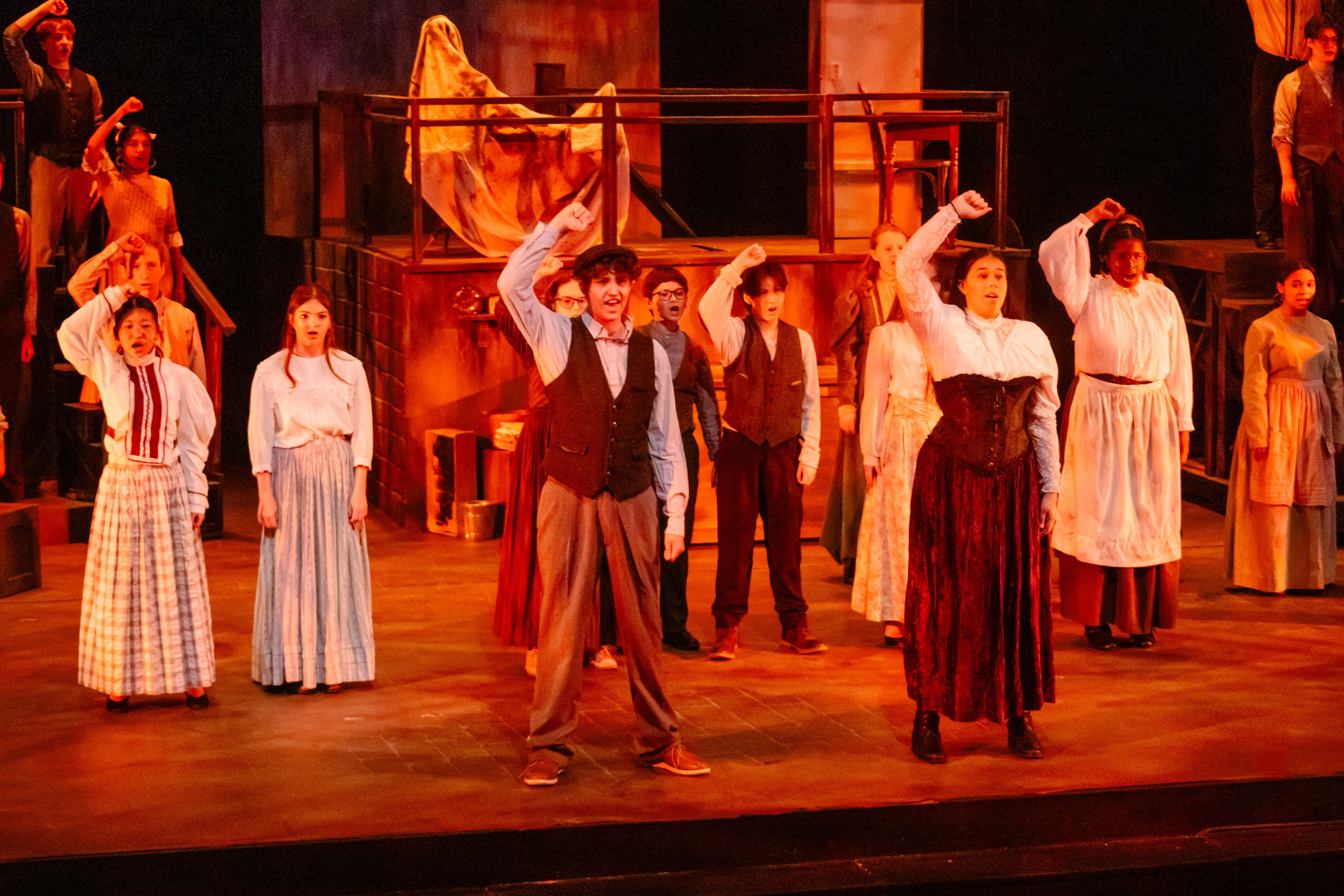 Students performing on stage