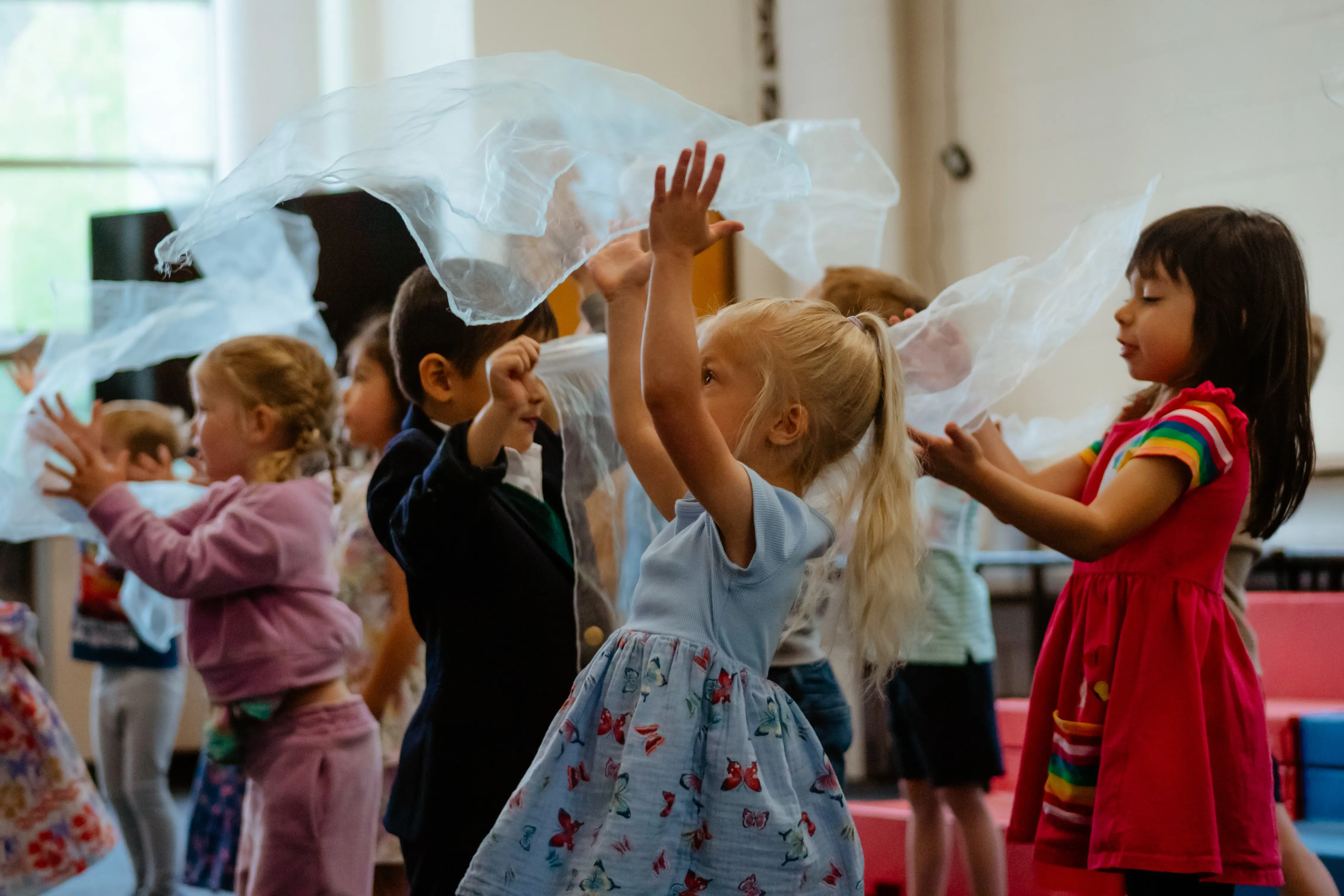 Lower school students dancing together in class