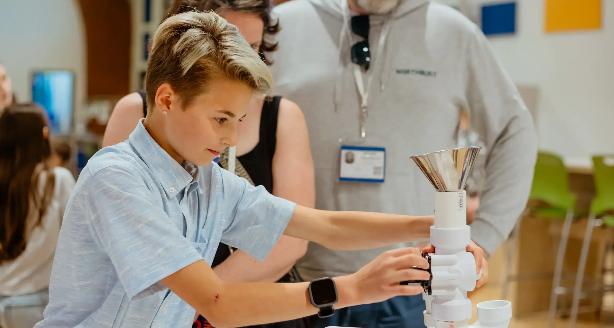 Student presenting a project at a science fair