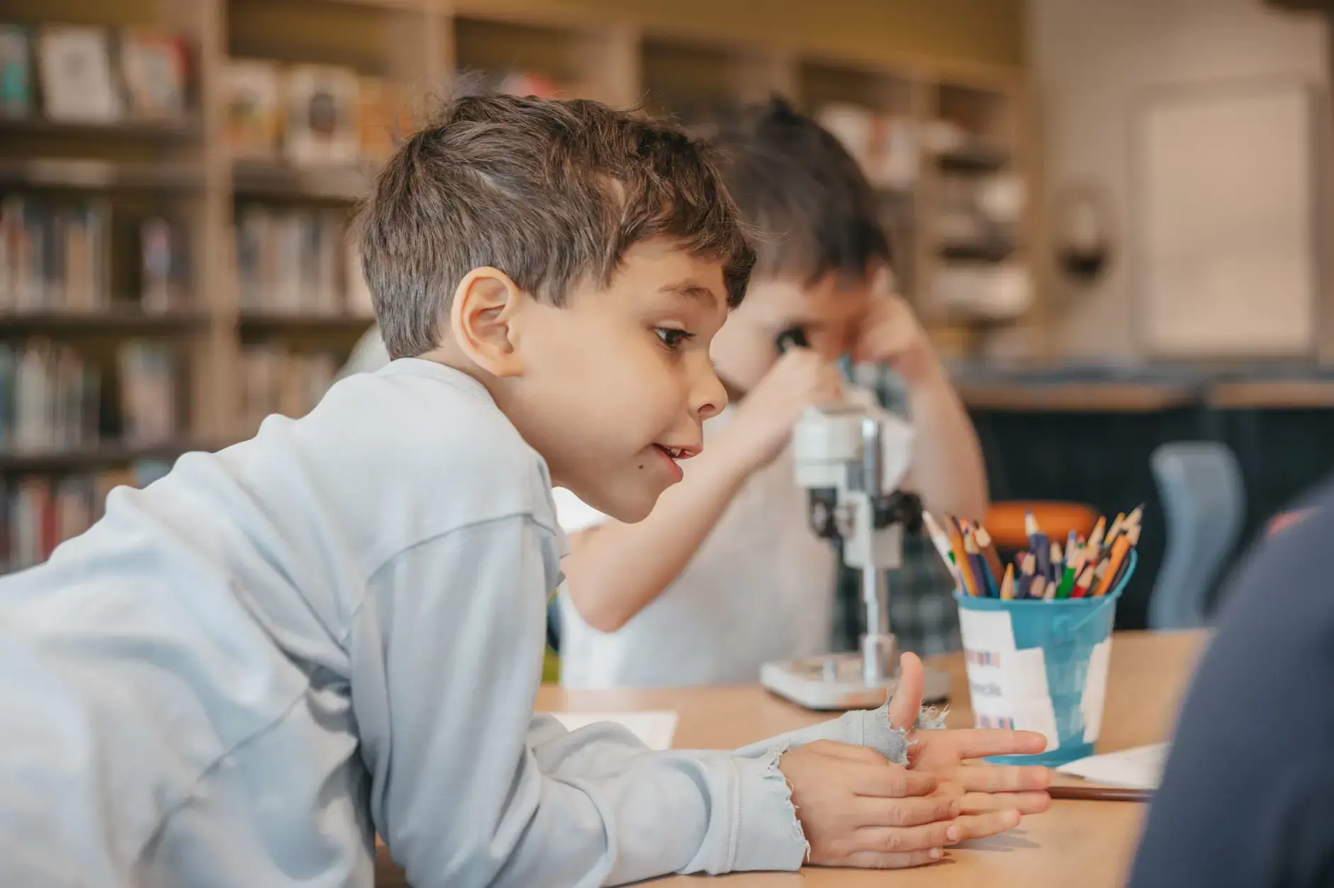 lower school students coloring 