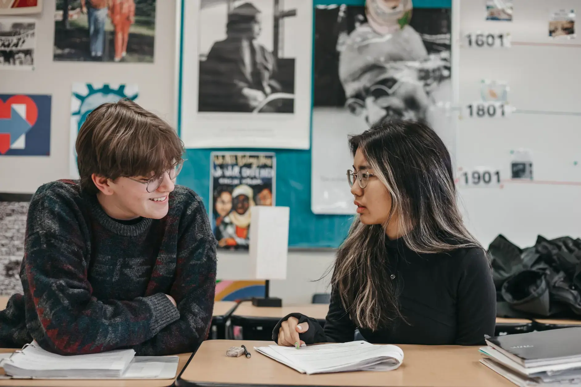 students having a conversation in the classroom