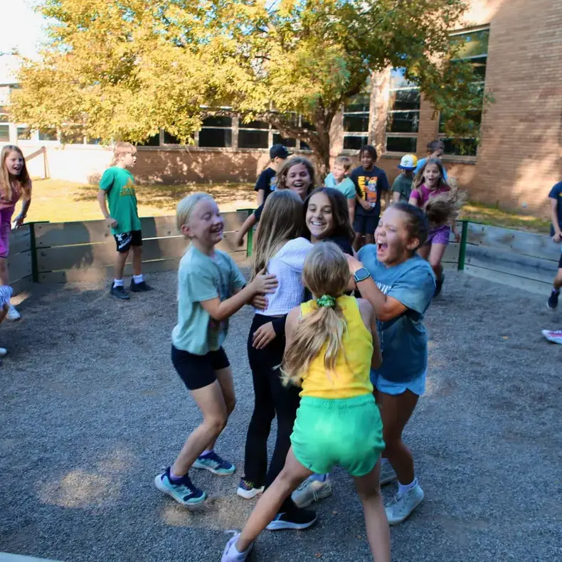 group of students playing outdoors