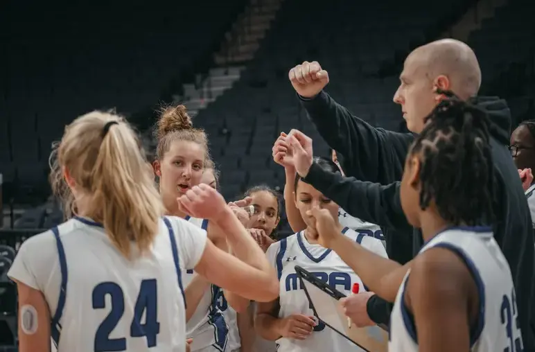 Students Playing Basketball with Coach