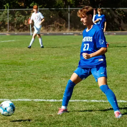 Student Playing Soccer