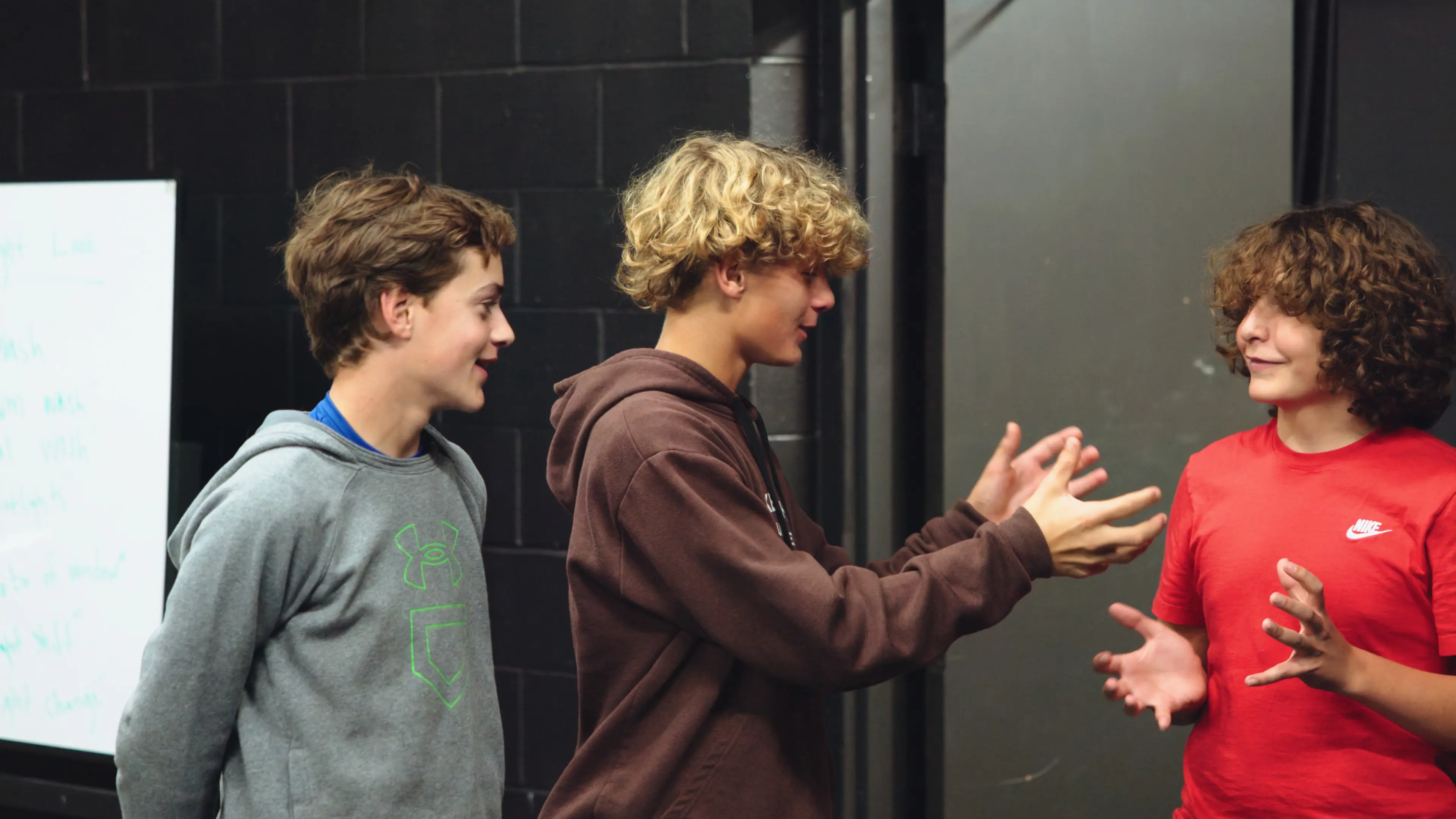 Students practicing in a theatre class