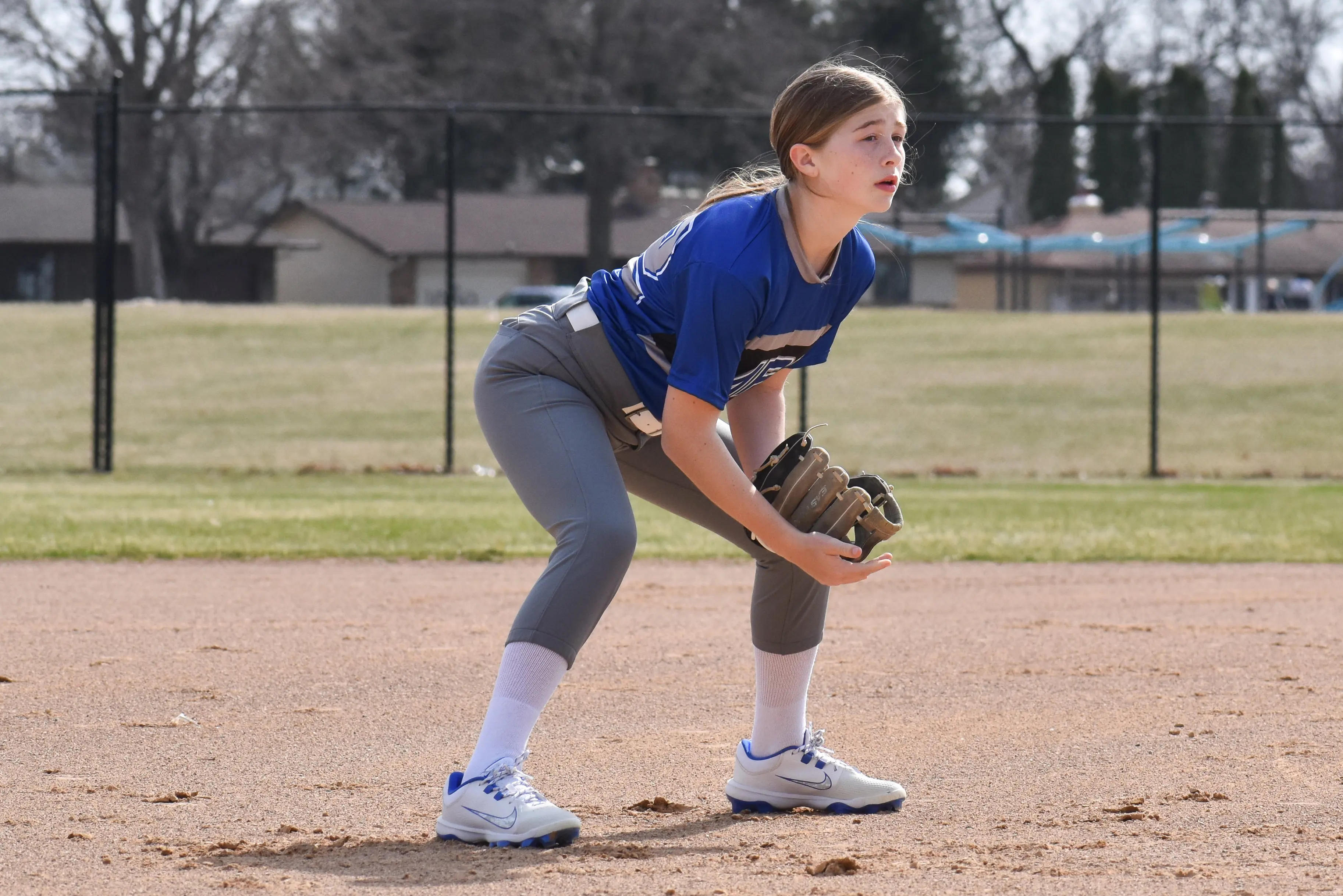 Softball player ready to field the ball
