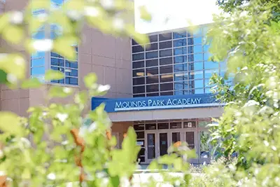 Shot of the Mounds Academy building