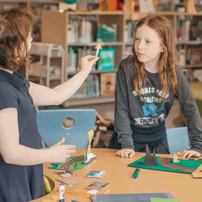 Students making arwork in arts class