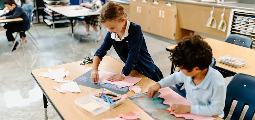 Students participating in an artwork activity in arts class