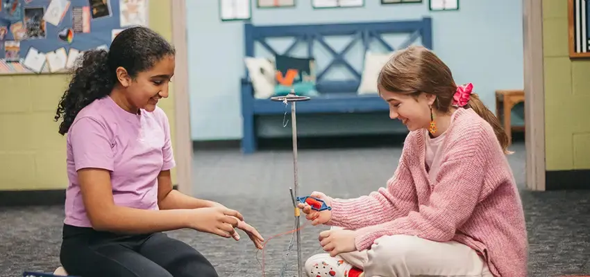 Students collaborating during play