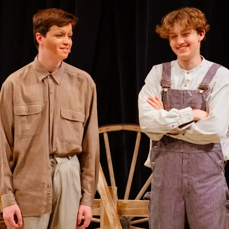 Students performing on stage