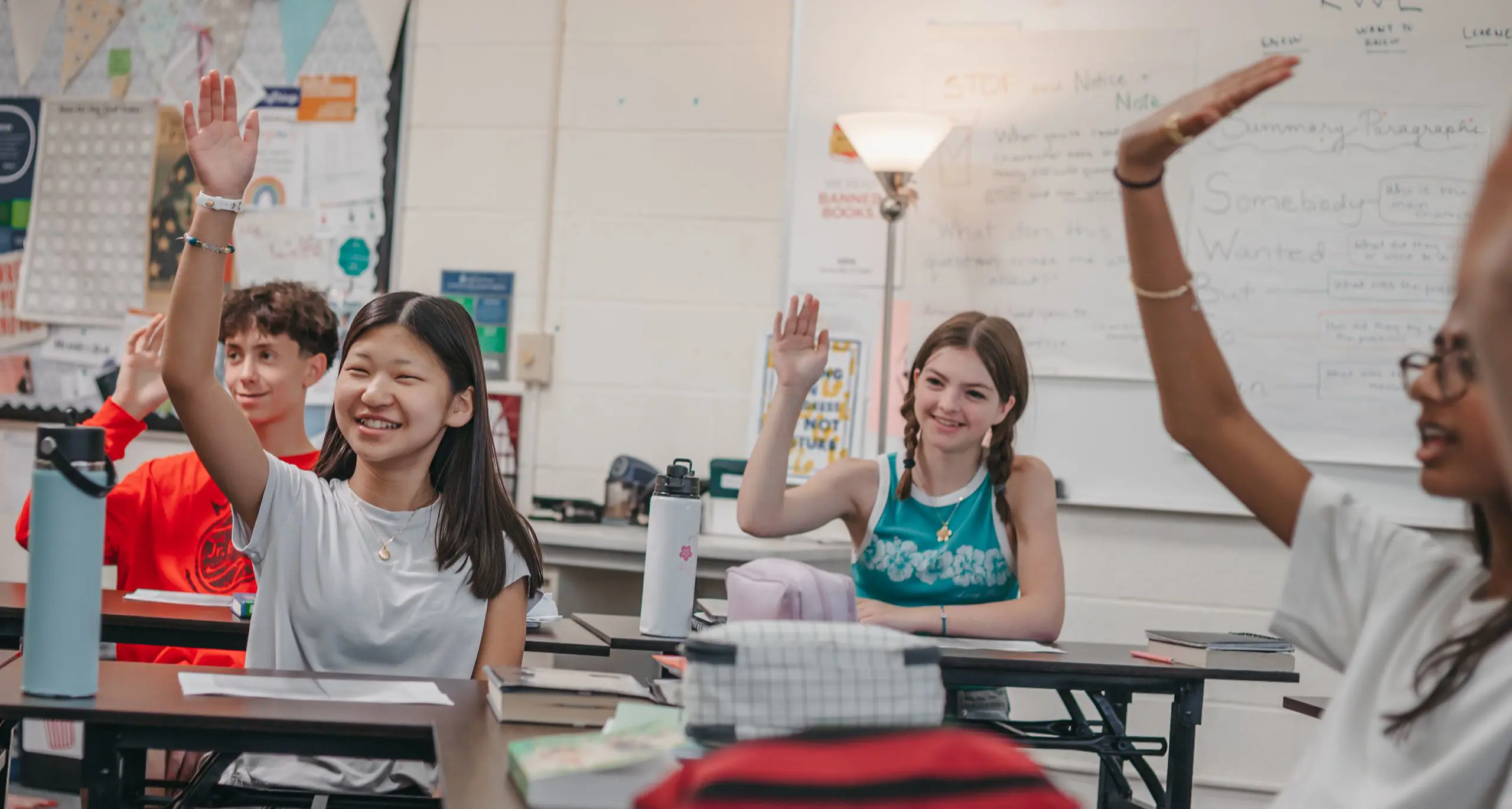 Students raising their hand