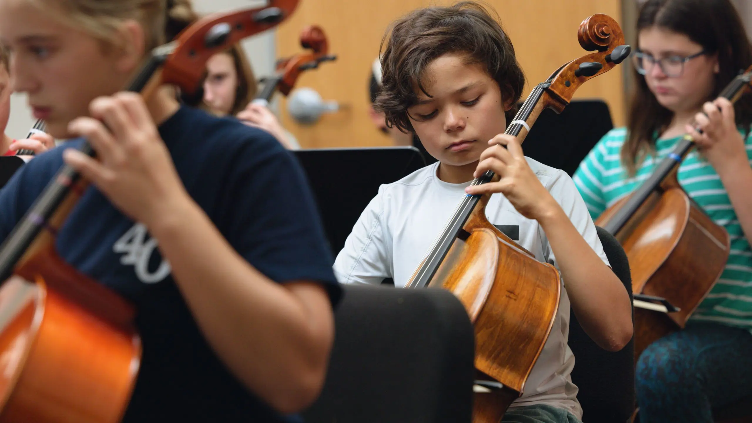 Student playing the chello