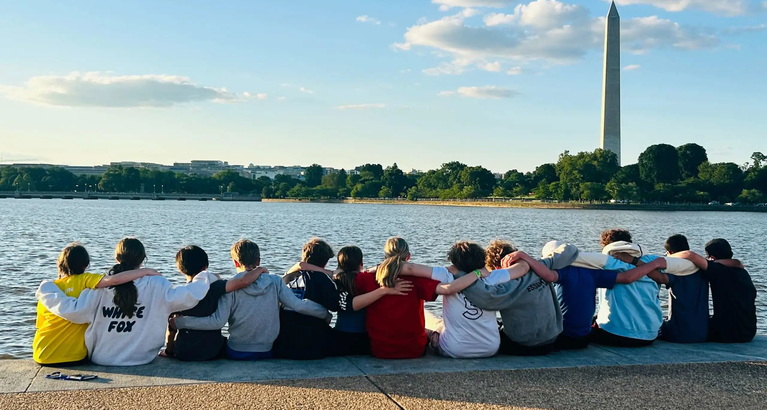 Students enjoying lakeside community time together