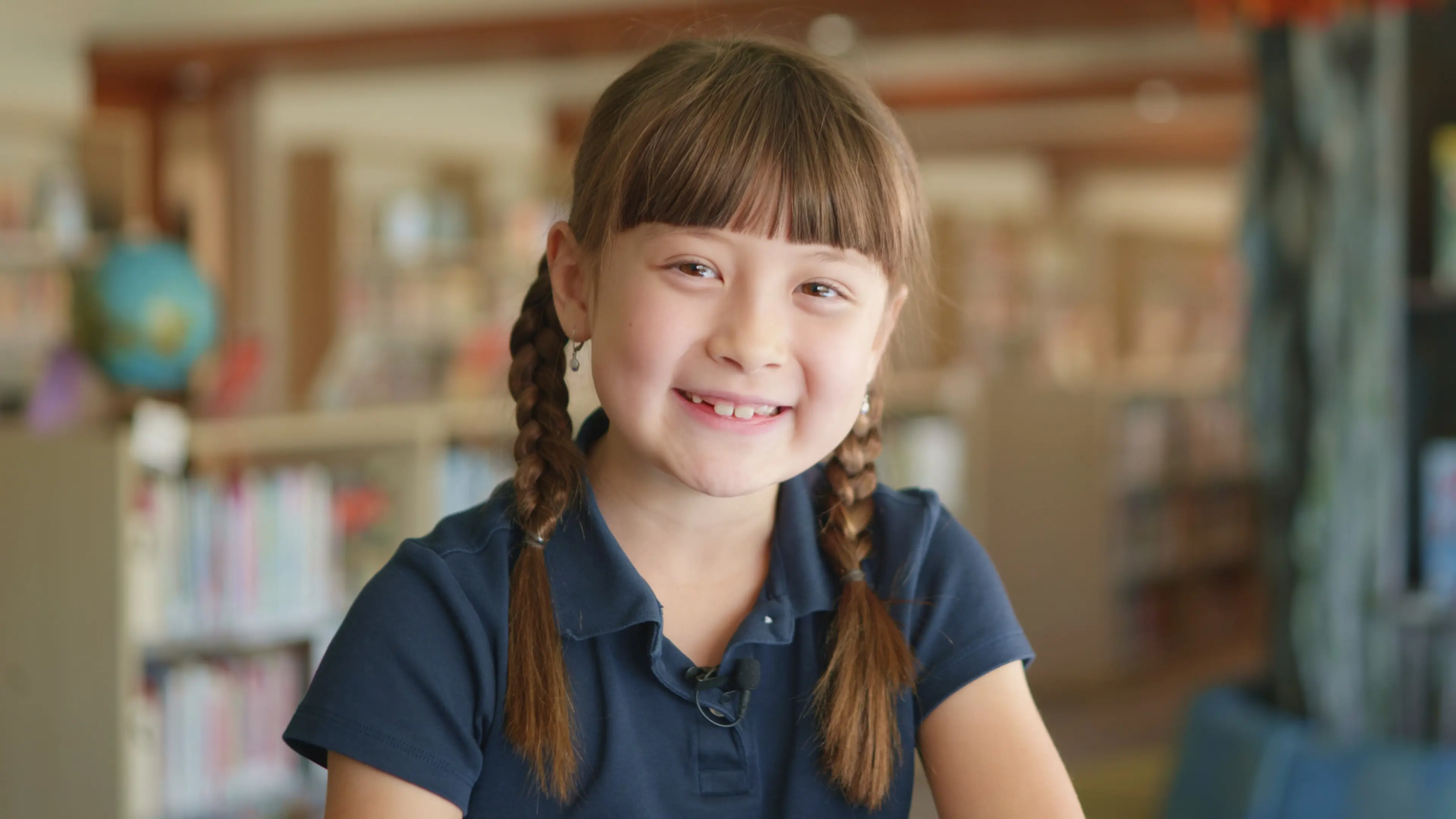 Lower school student smiling