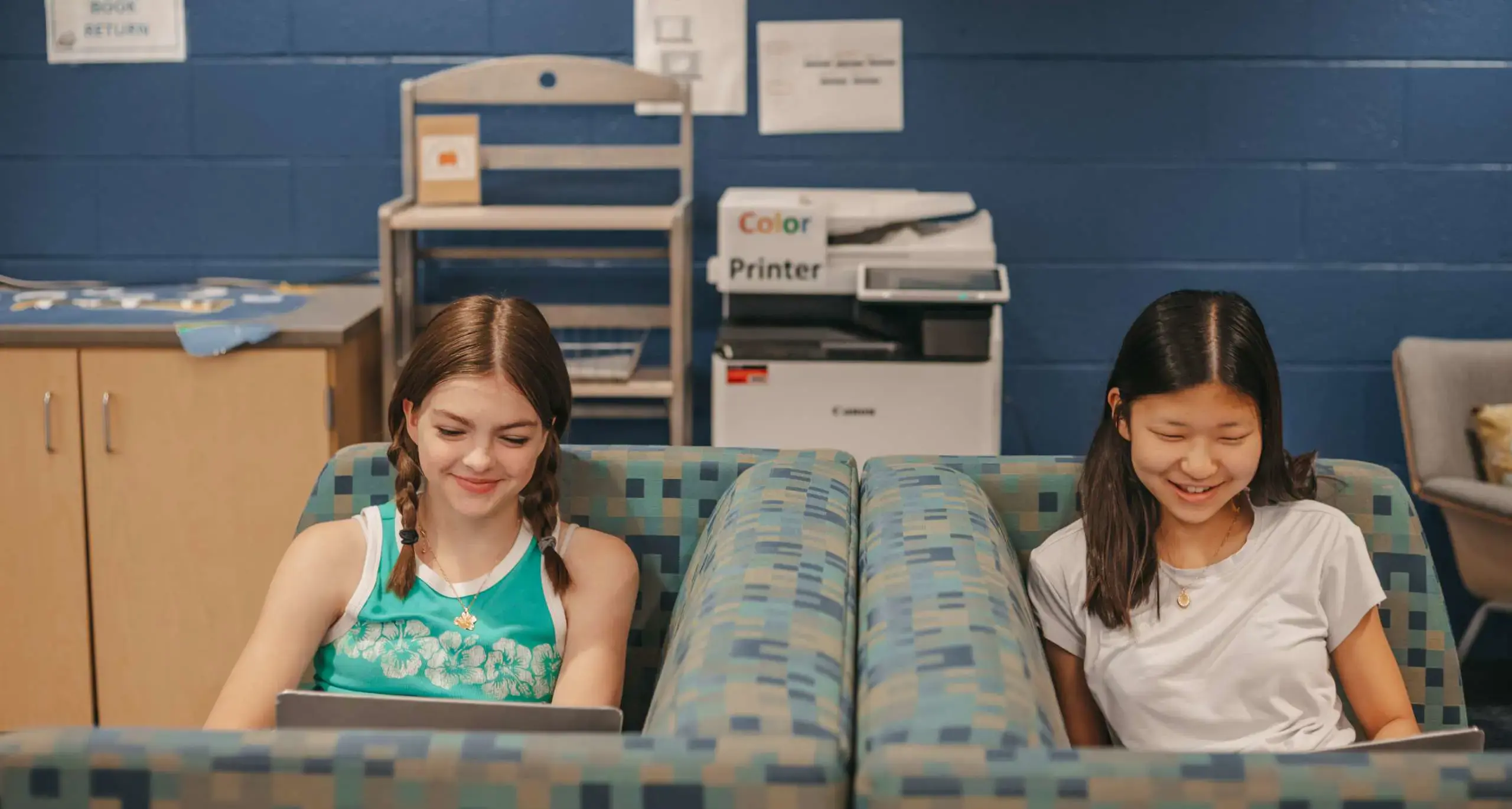 Students studying with their laptops