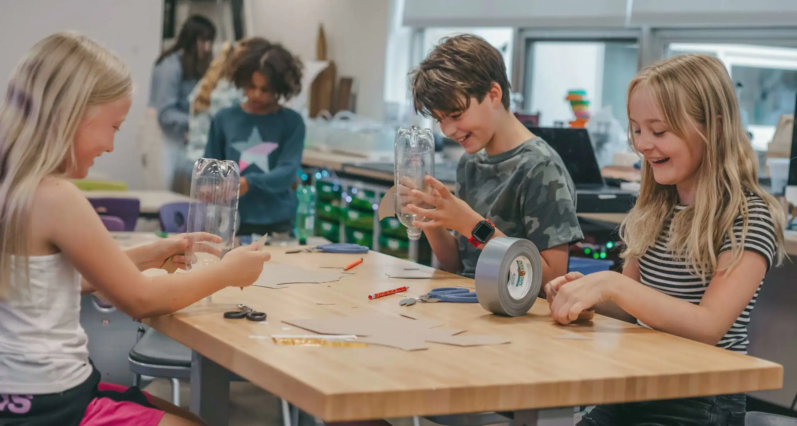 Students collaborating on an arts project