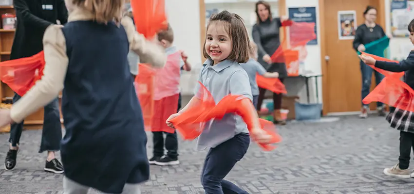 Students dancing with ribbons