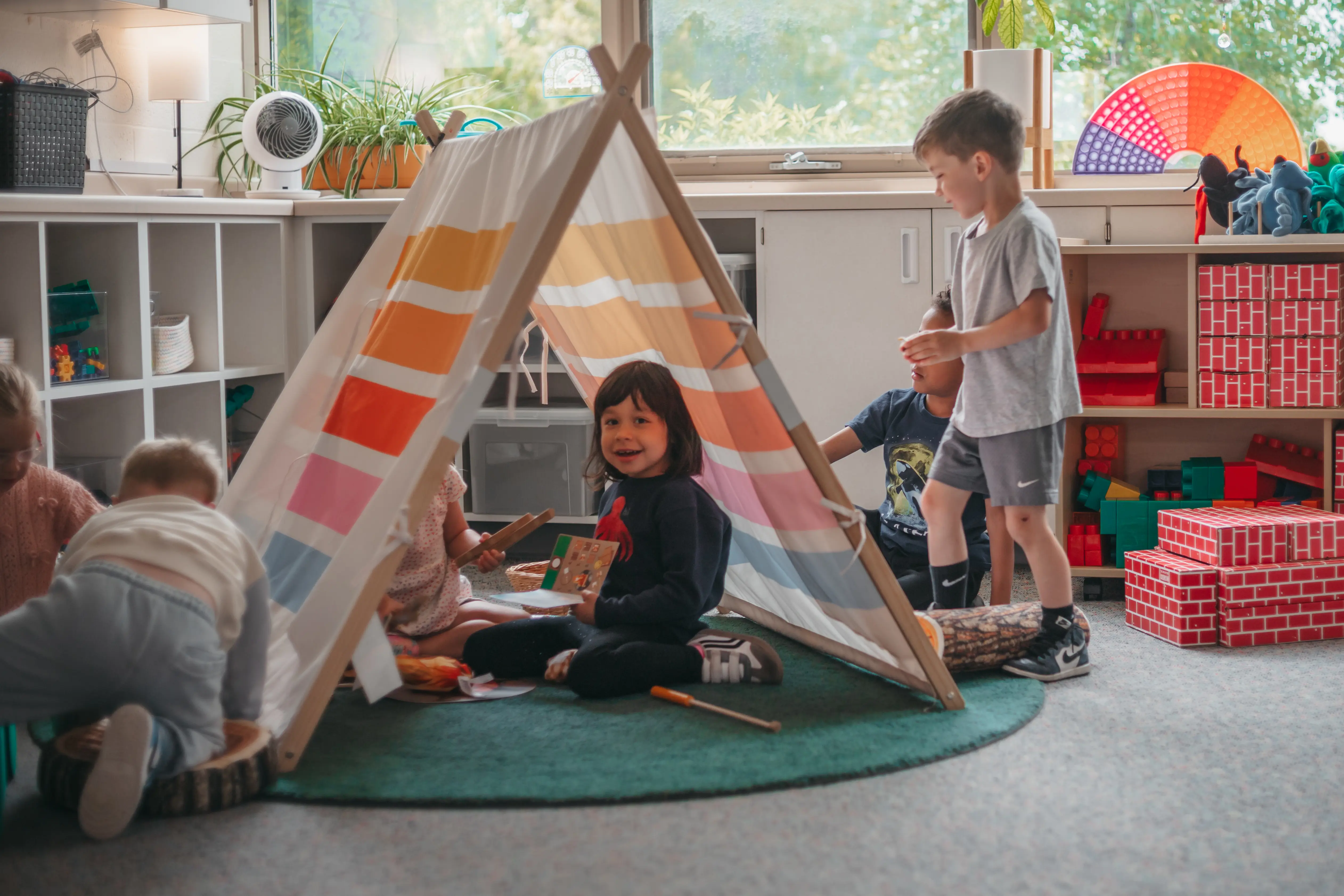 Students playing indoors