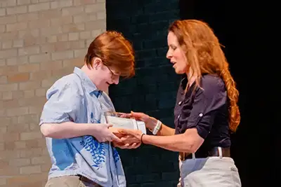 Student receiving an award