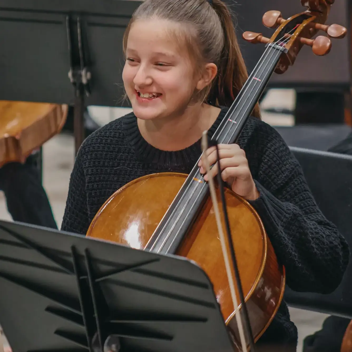 Student playing the chello