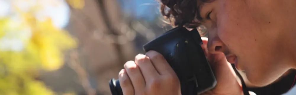 Student taking an picture with a camara