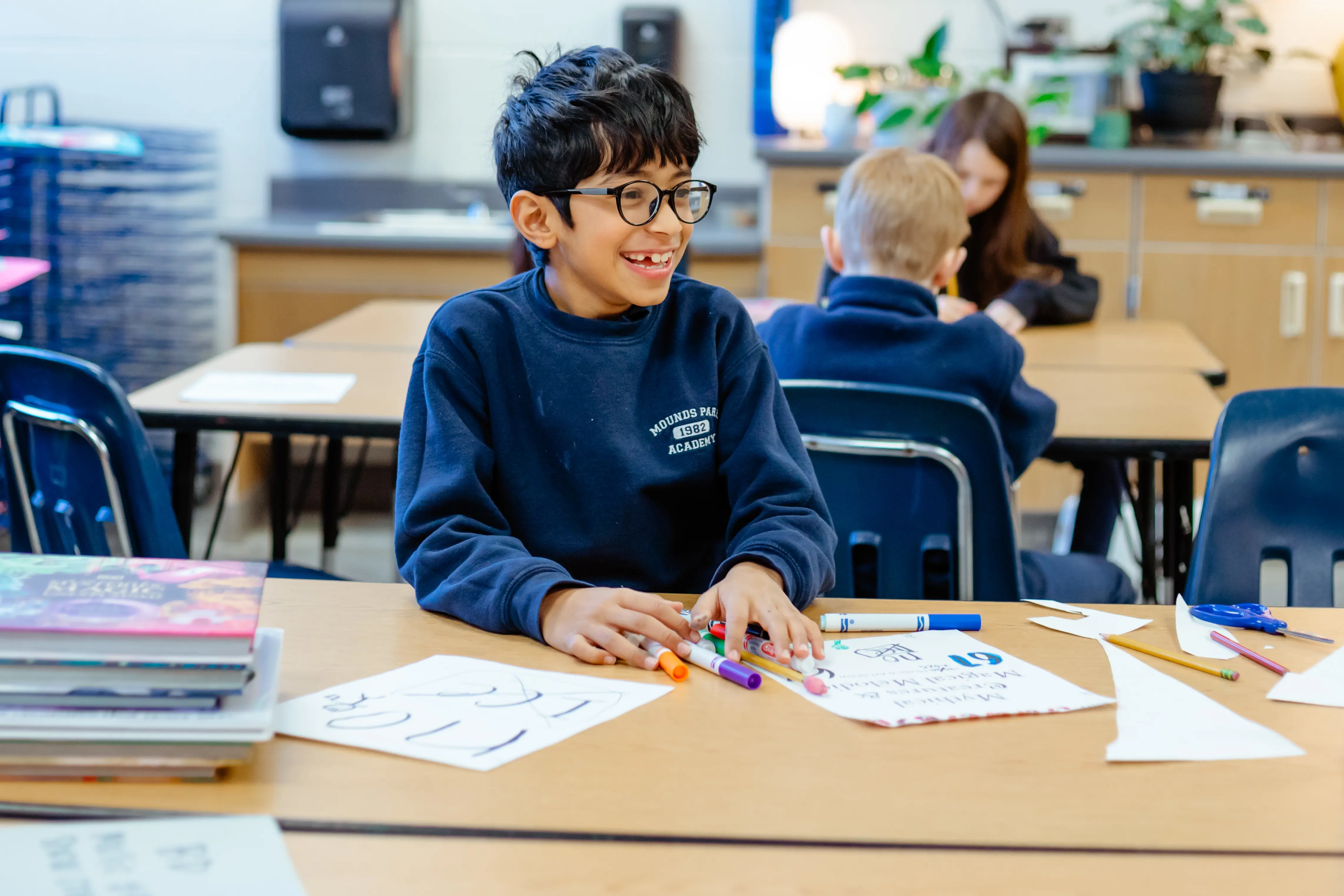 Student working on a creative classroom activity