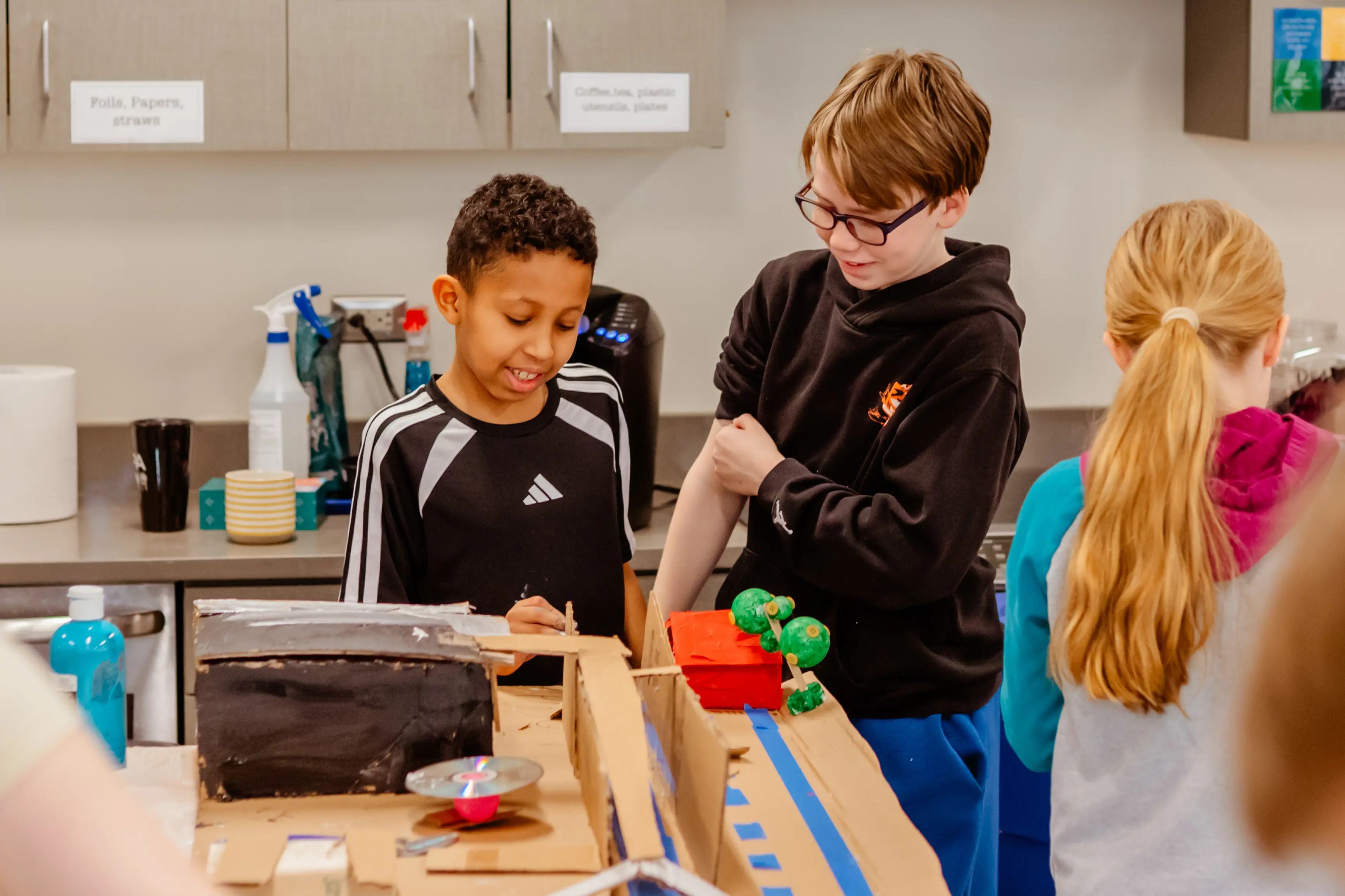 Students collaborating on a hands-on engineering project.