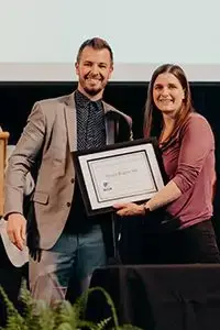Claire Porter receiving an award