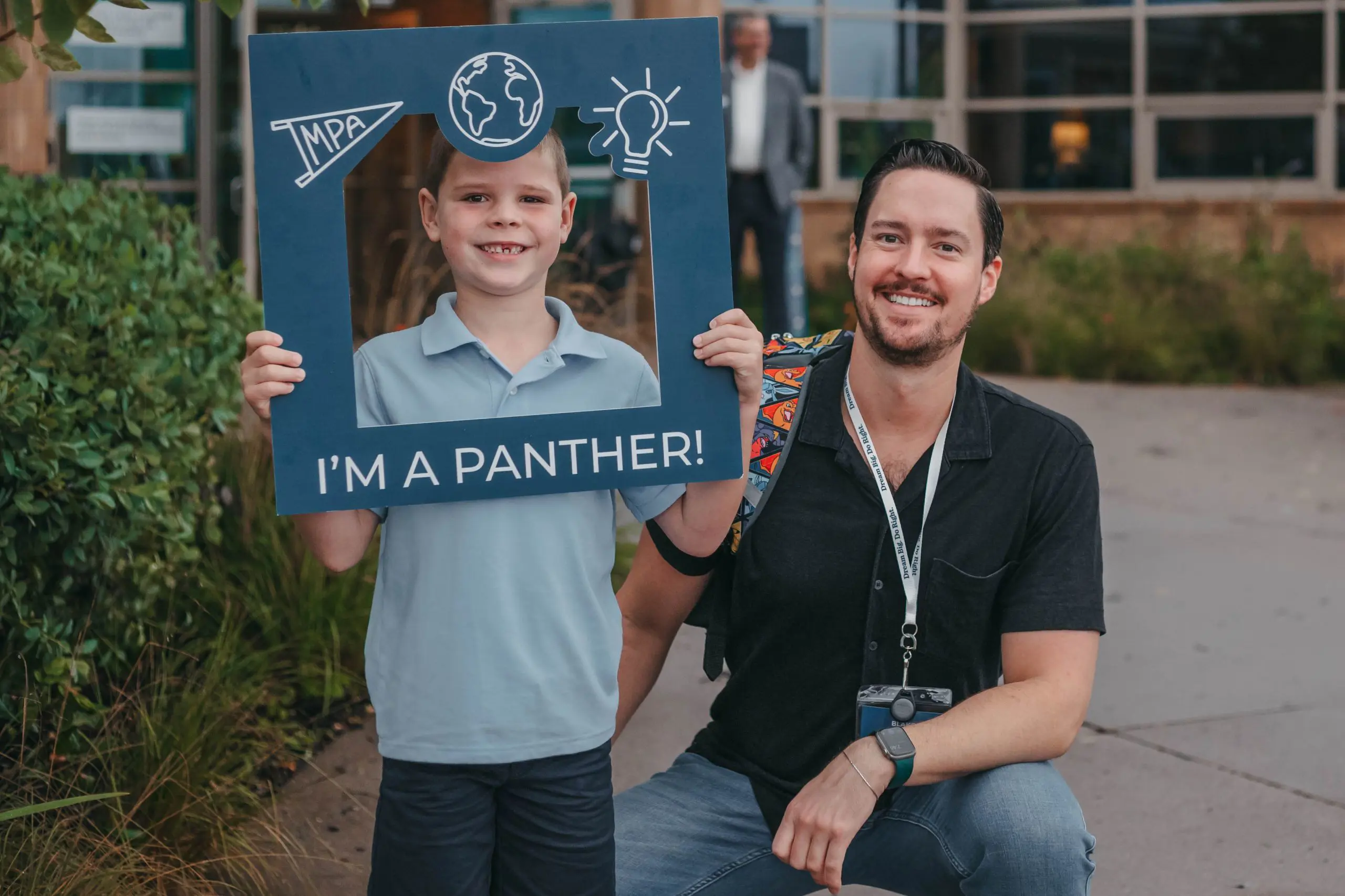 Student and parent celebrating the first day of school.