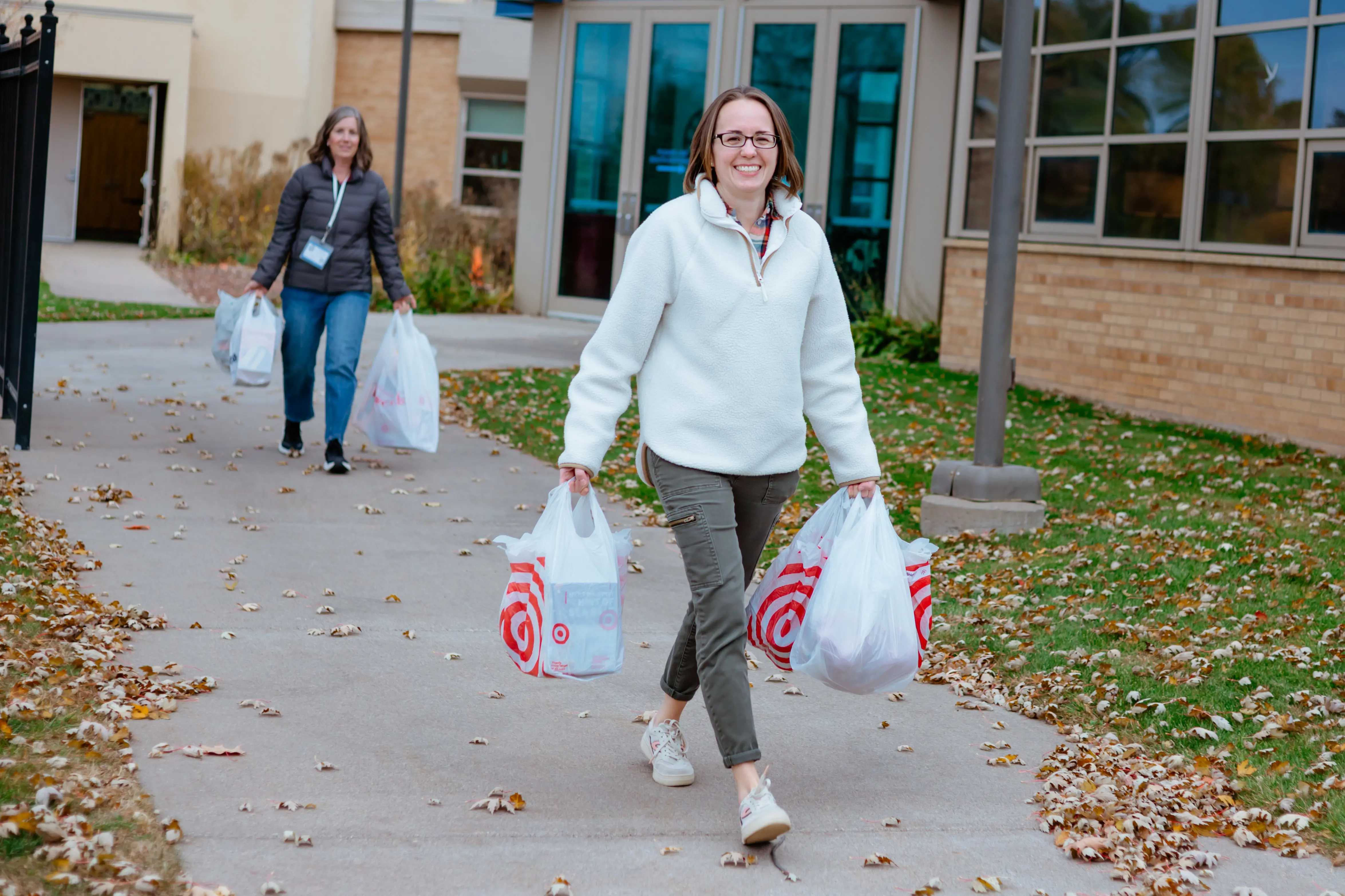 Volunteers delivering donations to support the school community.
