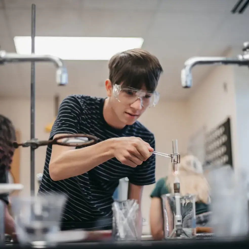 Student engaging in a science activity
