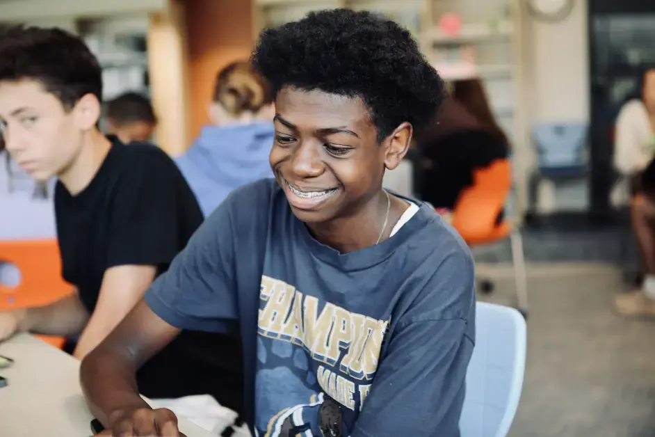 Middle school student smiling