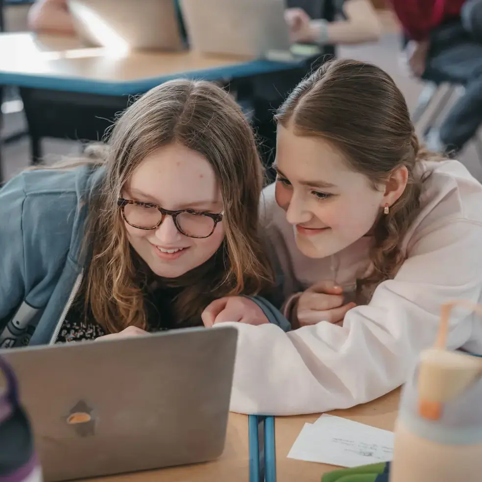 Students helping each other during a lesson