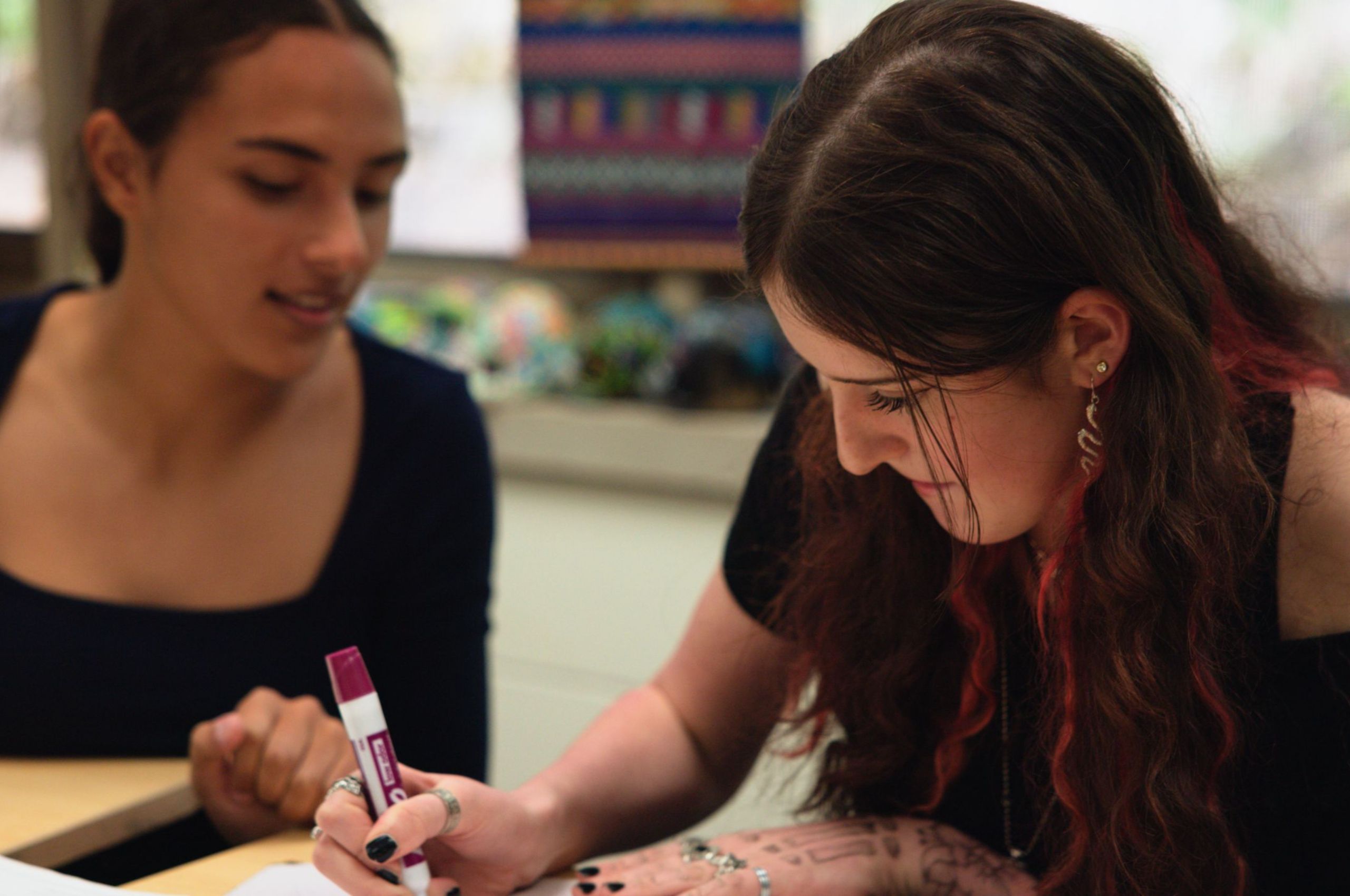Students collaborating on a classroom assignment.