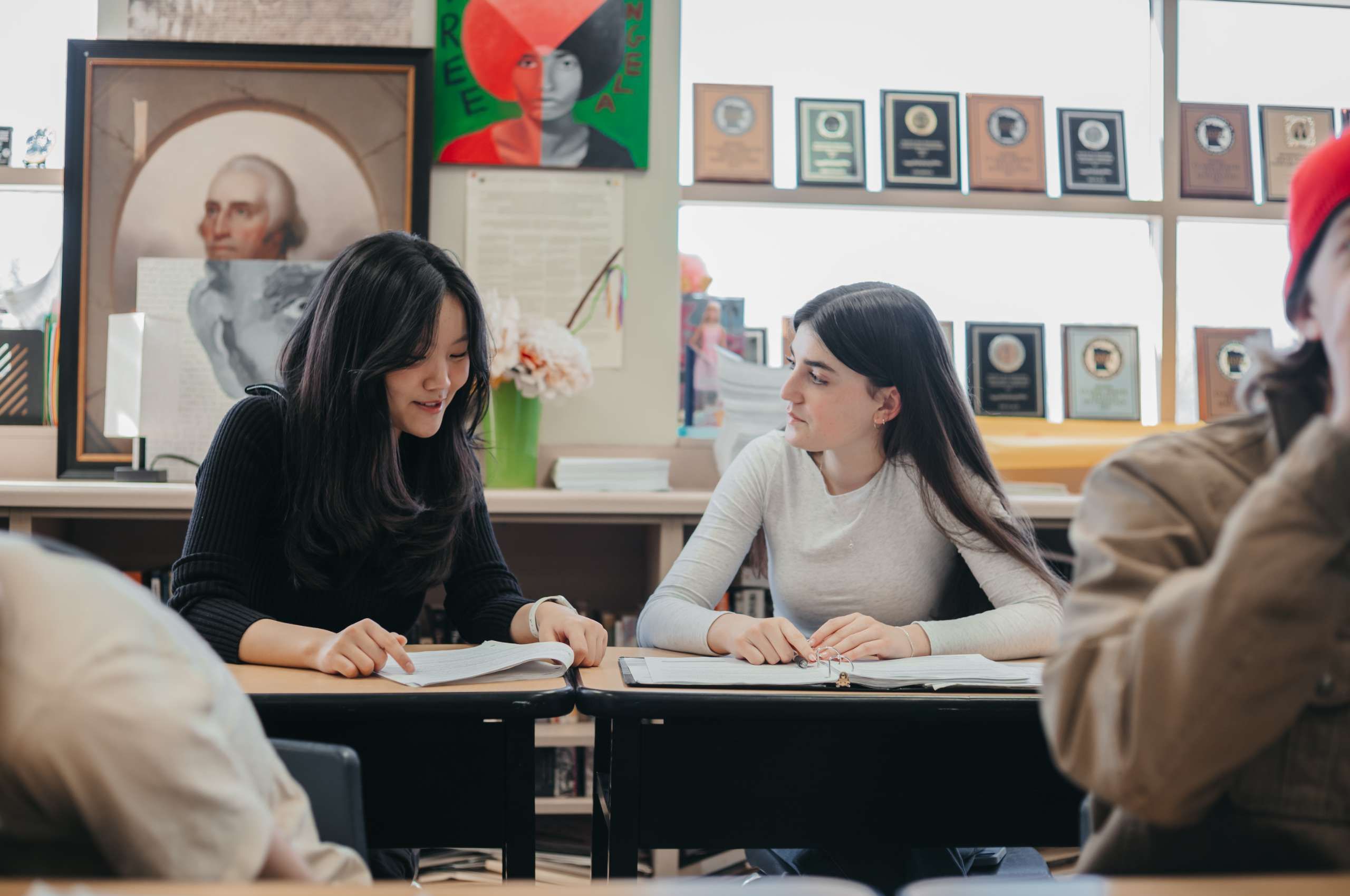 Students collaborating during a classroom discussion.