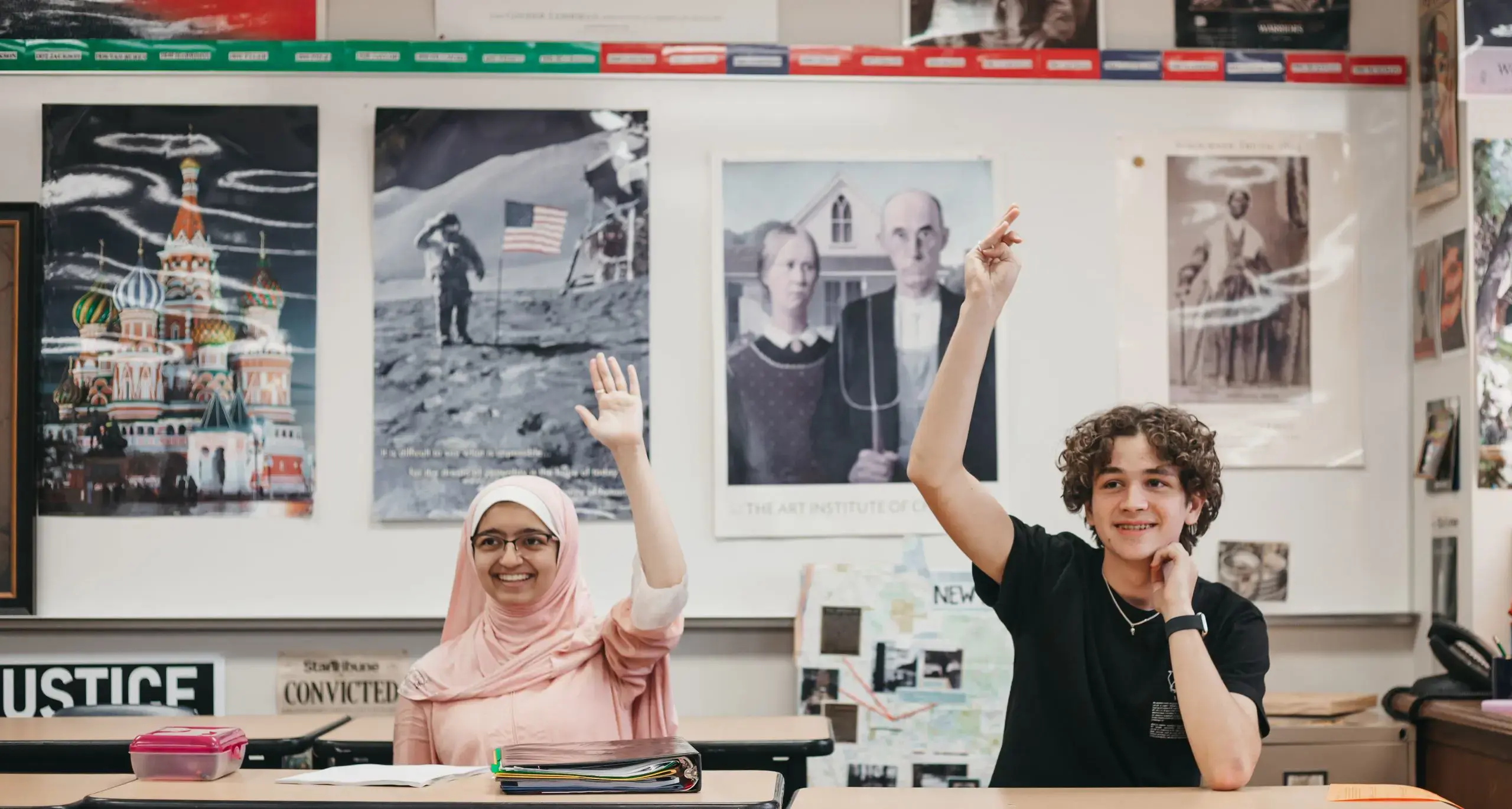 Students raising their hand