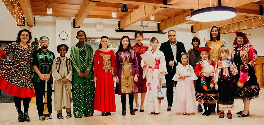 From left to right:  Students and families celebrating at a cultural event