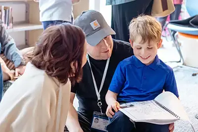 Parents talking to student